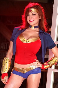Busty Tessa gets into costume as Wonder Woman for Halloween
